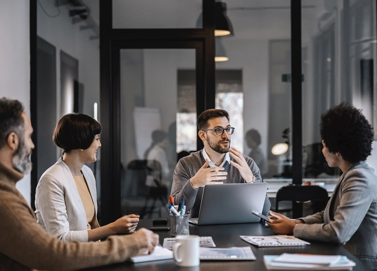 Team discussion around a conference table